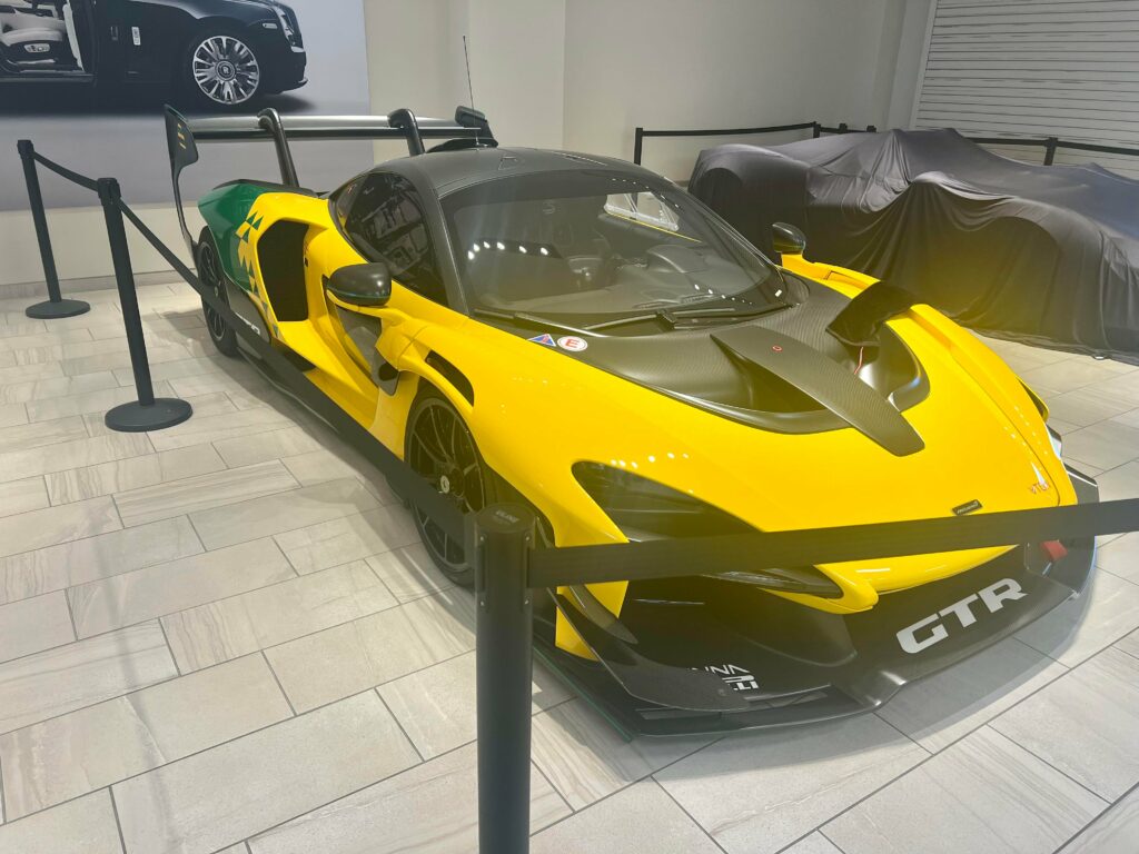 [Mclaren Senna GTR] At Lamborghini dealership.