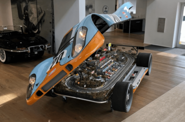 Full-sized Porsche 917 replica that conceals a 1:32-scale working wooden slot car track faithful to the iconic Le Mans raceway.