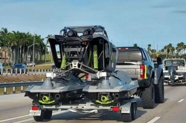 Found elsewhere, I know nothing except its a buggy on jet skis.