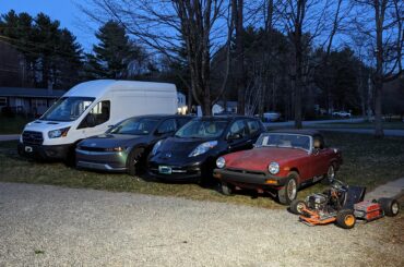 Here's my whole household of EVs! From right to left: DIY eKart (25kW/5kWh in 150lbs), electric swapped '78 MG (summer fun car), '12 LEAF (partner's commuter), '22 IONIQ 5 (my commuter + road trip car), '23 eTransit high roof (company work van that I was borrowing for the weekend)
