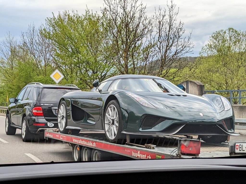 [Koenigsegg Regera] on a rental trailer, pulled by a Mercedes ML, spotted near the Swiss border in southwestern Germany