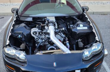 Generation 4 Camero with some kind of crazy LS swap.