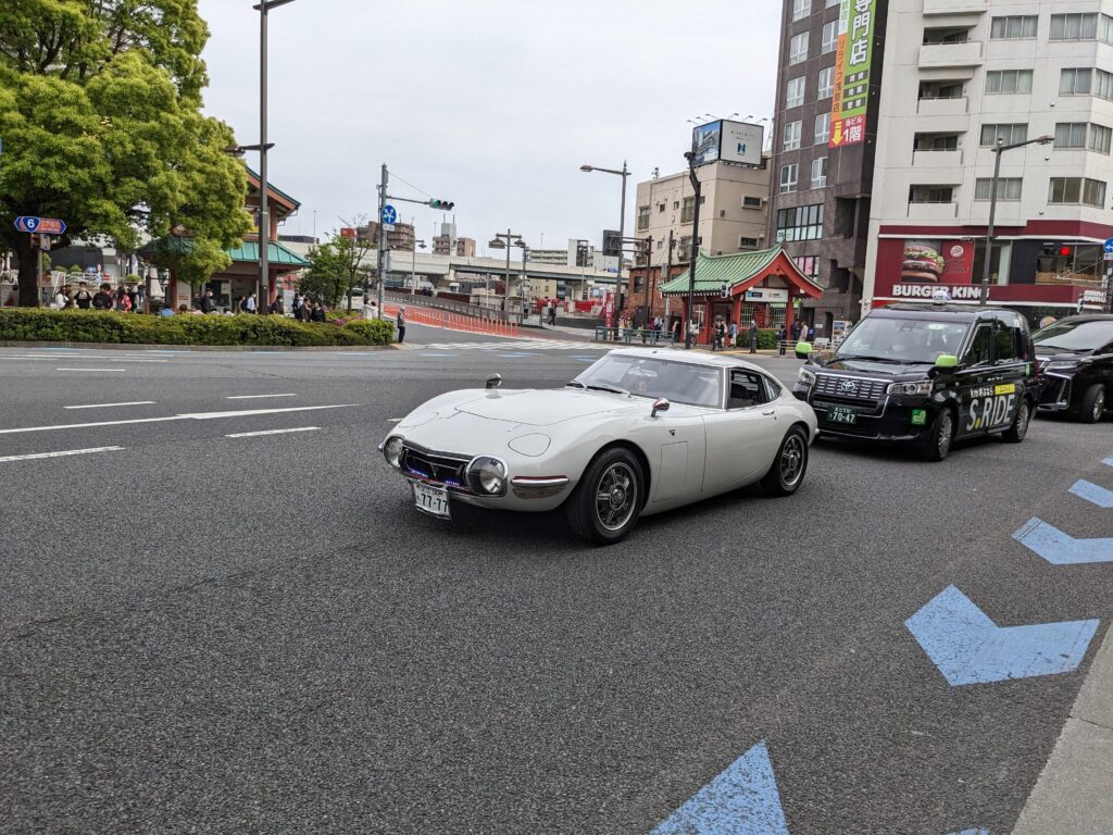 Amazed seeing an owner driving [Toyota] 2000GT through the city