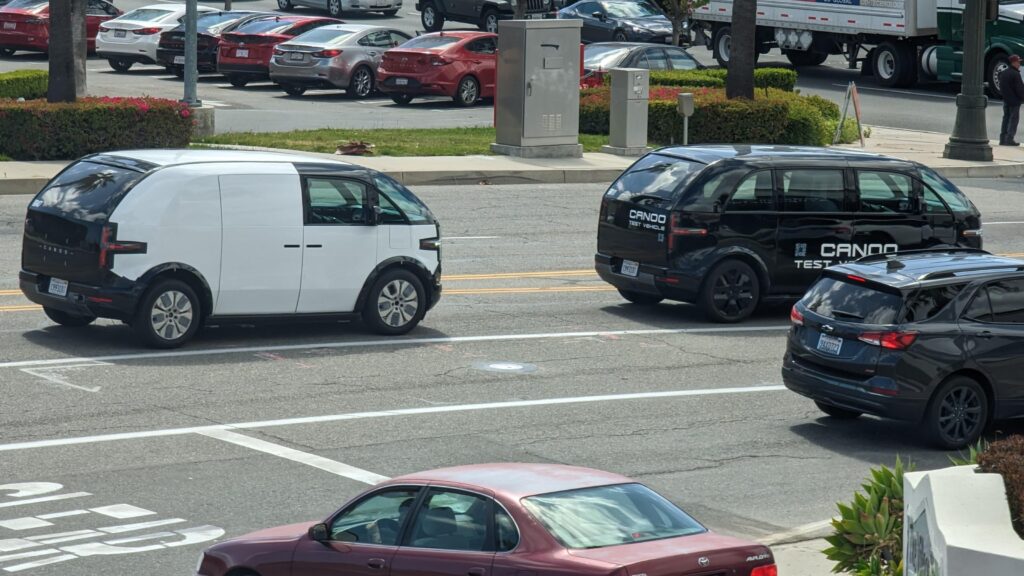 A couple of Canoo EV's taking a drive in Southern California