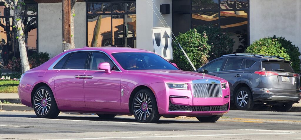 [Rolls Royce]. Hope it is paint and not a wrap. Love crazy inappropriate colors.