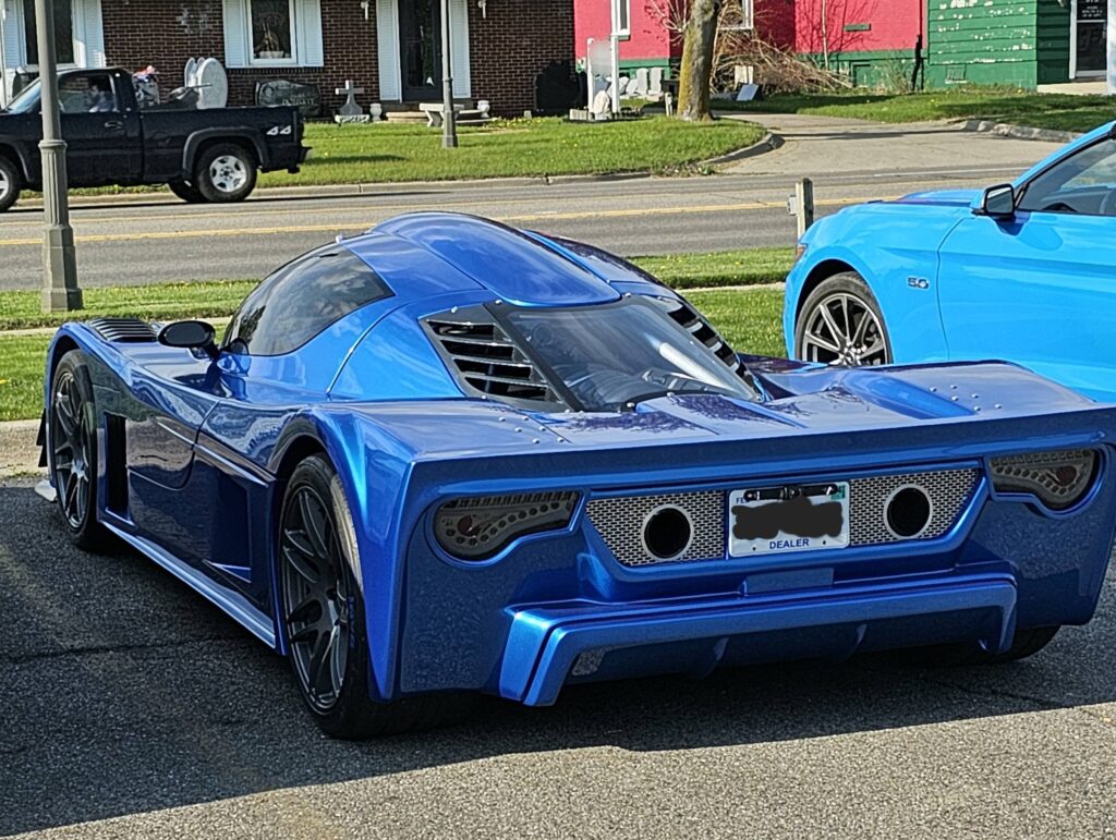 [Unknown] It appears to be a kit car, I think? Not sure what it is based on, but it has Ultima vibes (minus the taillights)