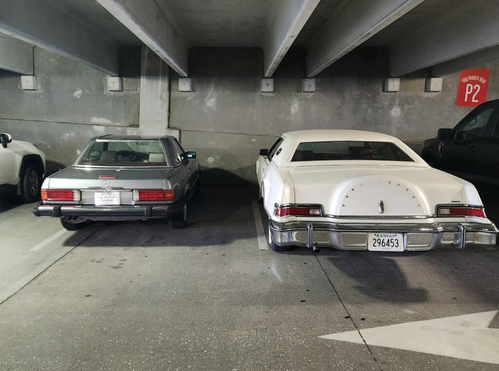 Took my '76 Lincoln Mk IV out for pizza, parked next to the next oldest car in the garage, an 80s Mercedes of a different size