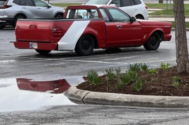 There are THREE different vehicles here mashed up into one. Can’t quite tell what the middle car is. Crown Vic?