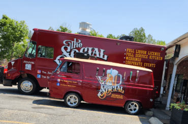 An old Ford Econoline turned into a mobile beer tap.
