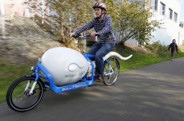 Alan Dowden of the Seattle Sperm Bank rides the Sperm Bike, a custom-designed, high-tech bicycle used to deliver donated sperm to fertility clinics, in Seattle November 8, 2011. The bike has a liquid-nitrogen dewar to keep the sperm. . . fresh in transit.