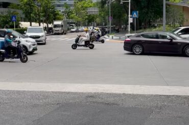 Shenzhen in a nutshell: electric scooters in abundance coming with food ordered on delivery apps to people in the high tech corporations and startups in Nanshan, navigating around electric cars in pleasantly silent streets (all but 3 in the video are electric).