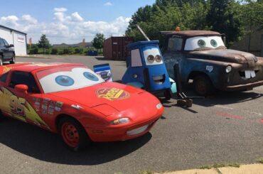 Sitting in front of a local repair shop