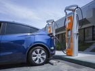 Chargepoint shows picture of prototype station with NACS plug charging a Tesla