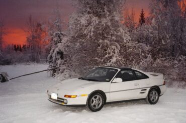 Kind of a crazy photo, really. Front plate, studded tires, block heater cord hanging out... Wish I still had this car (my first car). '91 MR2 Turbo.