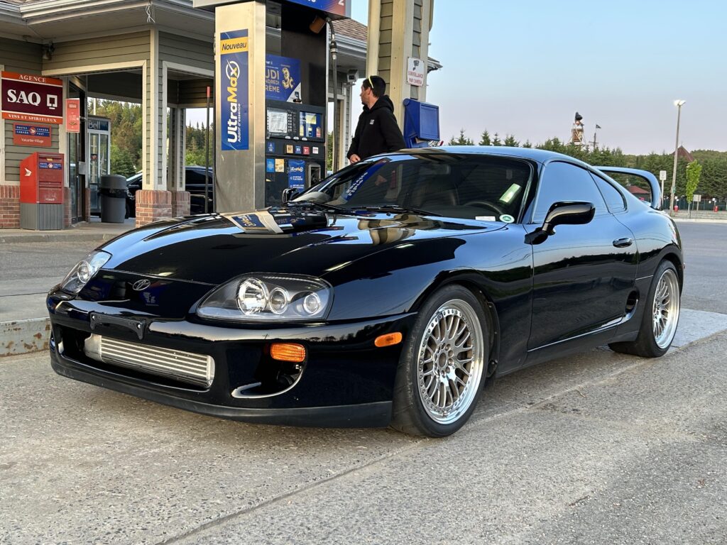 My dad was showing me the car he just bought, when this Supra MK4 pull up at gas station we where at