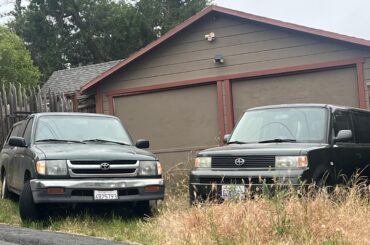Toyota Tacoma and a Scion engaged in a covert consultation. 🗣️🙊