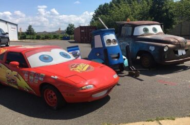 Sitting in front of a local repair shop