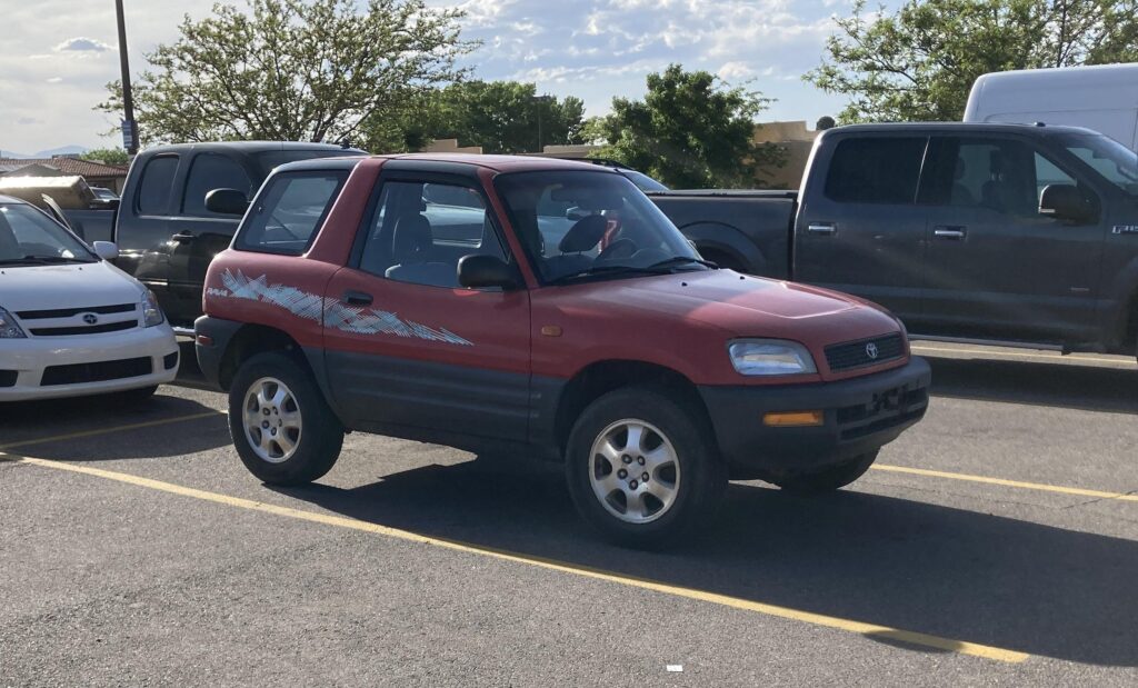 First Generation Toyota RAV4 2-Door with 90s side graphics - The official car of?