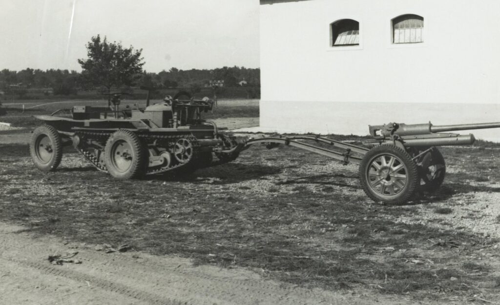 Austrian ADMK "Mulus" wheel-cum-track tractor towing a Böhler 47mm anti-tank gun