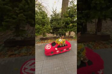 Is it Santa? Is it a reindeer? No! It’s Tiny in a VW Christmas jumper visiting festive streets…