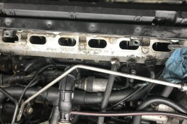 Coolant on top of two intake valves; cracked head? Bad head gasket? Or something else?