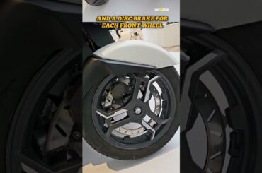 A three-wheeled electric scooter with a TWIST! #heromotocorp #hero