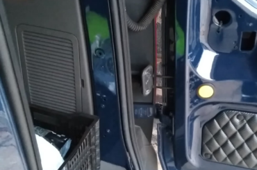 Diamond Tucked Carbon Fiber Spare Tire Cover Inside a 2020 Transit Connect