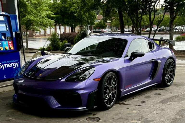 Just a metallic purple [Porsche 718 Cayman GT4 RS] getting gas