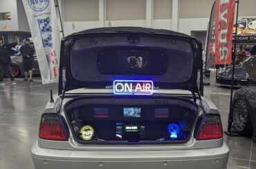 Bagged BMW with a clever sign