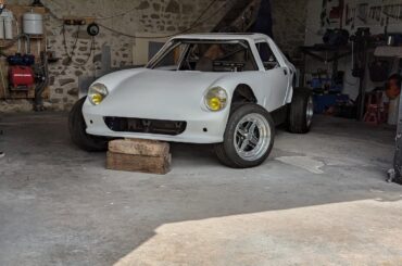 The size of a Honda Beat with the power to weight of a Ferrari F40 and shaped like a friend