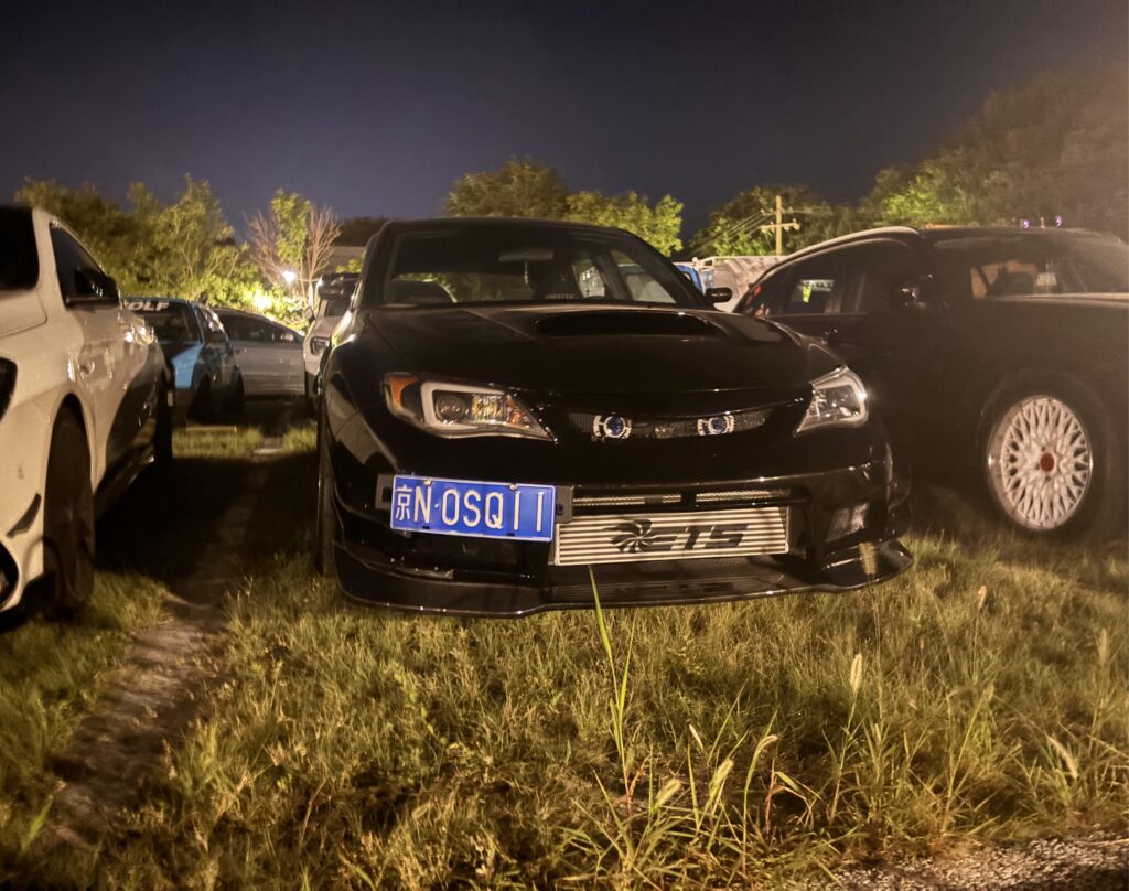 Confiscated illegally modified car in Beijing, anyone can tell me what those two things in the front grid are?
