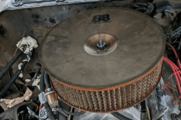 Using a cymbal as an air filter lid “It ain't stupid if it works.”
