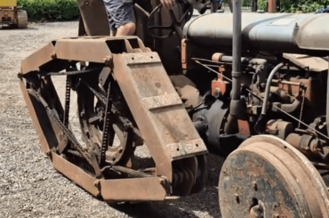 Trenching tractor with rotopad tracks