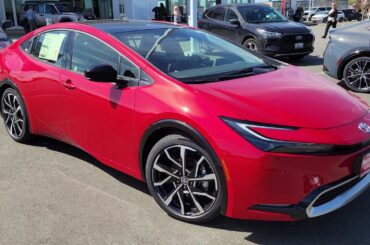 2025 Toyota Prius Plug-In Hybrid XSE in Supersonic Red