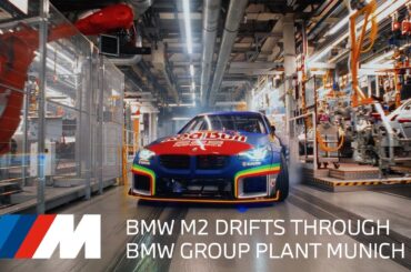 BMW M2 drifts through the BMW Group Plant Munich. Red Bull Germany x BMW M.