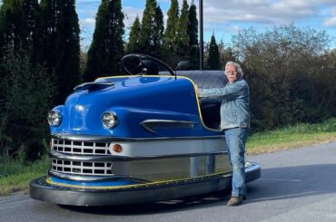 50s-era bumper car body with a 2007 Chevy Aveo.