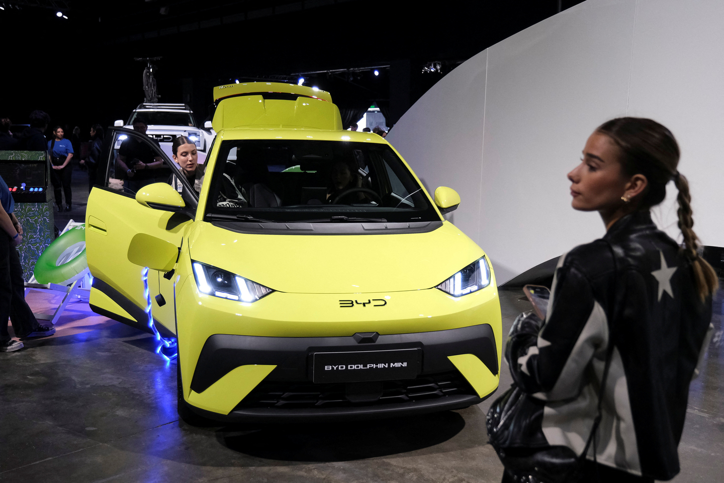 Visitors look at a BYD Dolphin Mini at the launch event of Chinese EV maker BYD in Buenos Aires, Argentina, Oct. 8. [REUTERS/YONHAP]