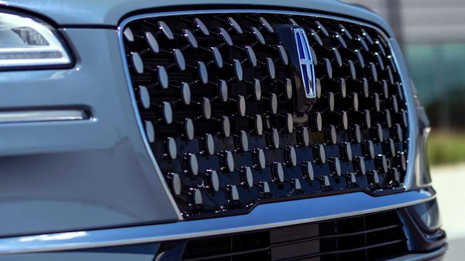 Close-up shot of the front grille on a gray 2023 Lincoln Corsair.