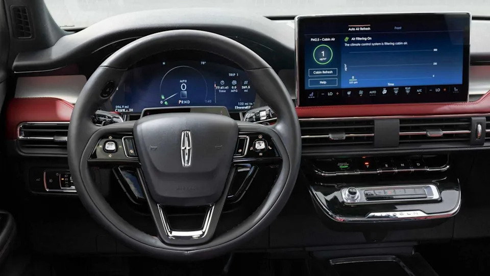 Close-up shot of the steering wheel and infotainment screen in a 2023 Lincoln Corsair.
