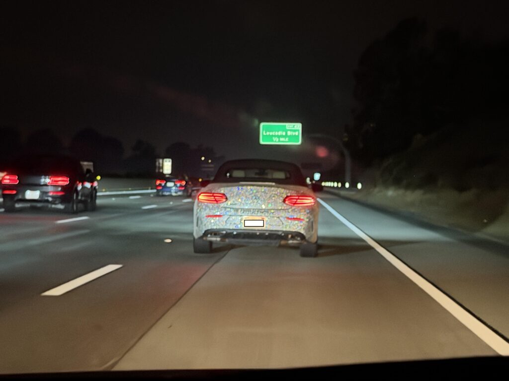 This Mercedes completely covered in rhinestones (photographed by passenger)