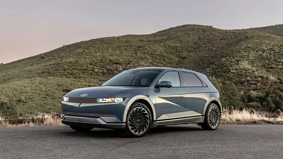 A grey 2024 Hyundai Ioniq 5 in the mountains.