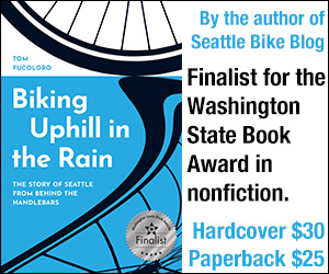 The book cover of Biking Uphill in the Rain: The Story of Seattle from behind the Handlebars with text by the author of Seattle Bike Blog. Finalist for the Washington State Book Award in nonfiction. Hardcover $30. Paperback $25.