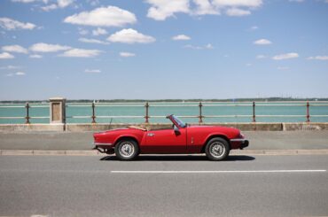 Triumph Spitfire at the seaside. This came out very "Wes Anderson"! (1600x1067)