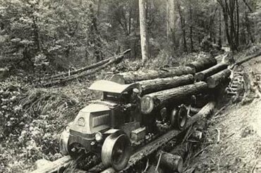 1917 AC Mack Bulldog with special wheels to allow it to run on log rails through the forest.