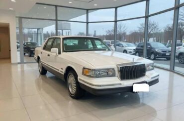 Used Car Dealer tried to use AI to enhance their pictures of the cars on their lot. This is the result.