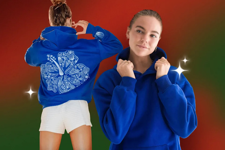 Pink Palm Puff blue hoodie with flower on the back.