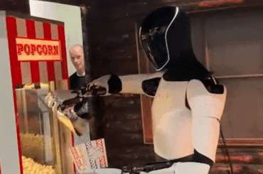 Tesla’s Optimus draws hundreds of fans for popcorn and selfies