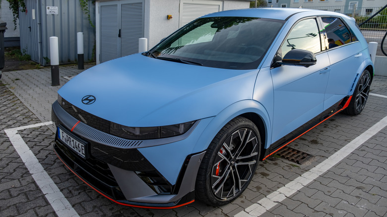 A light-blue 2024 Hyundai Ioniq 5 in a backlot.