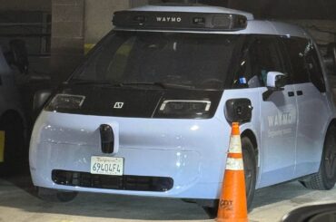 [Waymo Zeekr RT] unused in a Denver parking garage