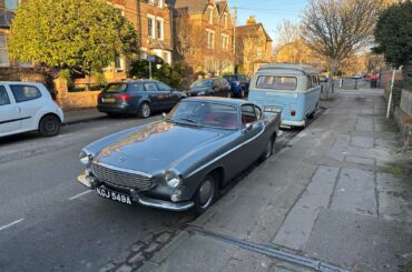 A [Volvo P1800] casually parked on an Oxford residential street